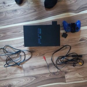 Ps2 with memory card and all cables works excellent
